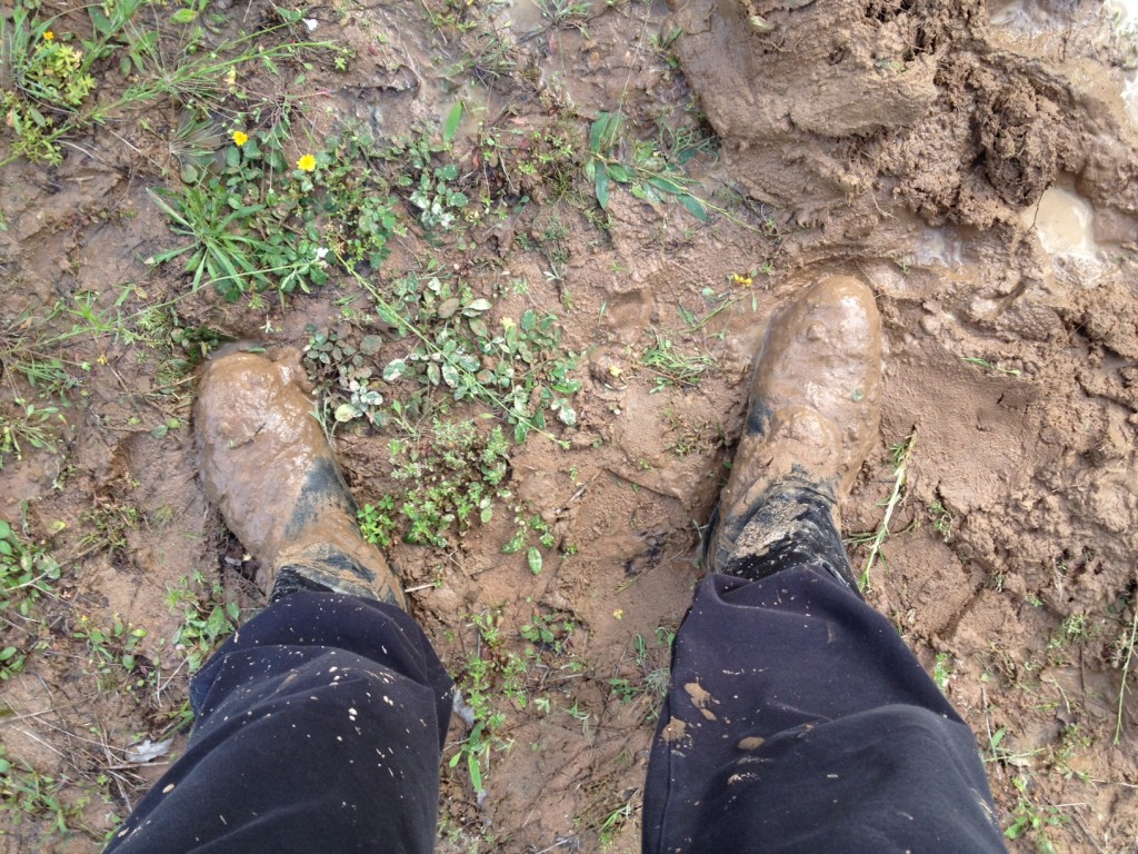mud-covered boots